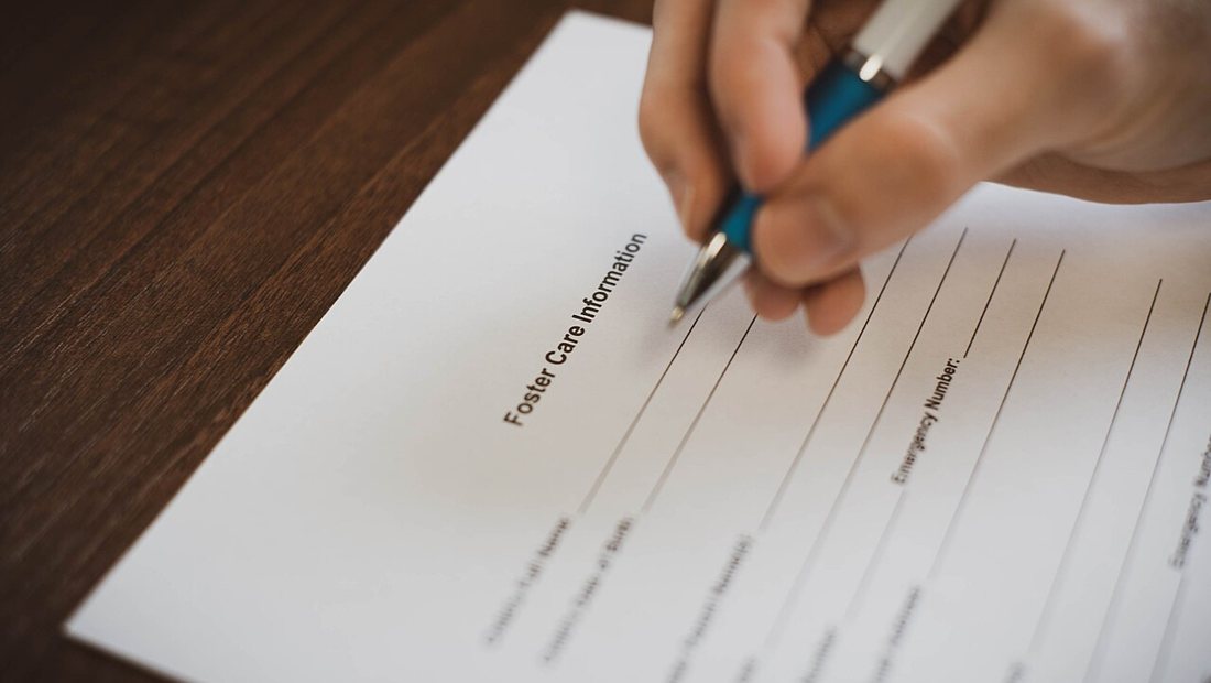 A tenant reviewing tenancy paperwork over a cleaning dispute